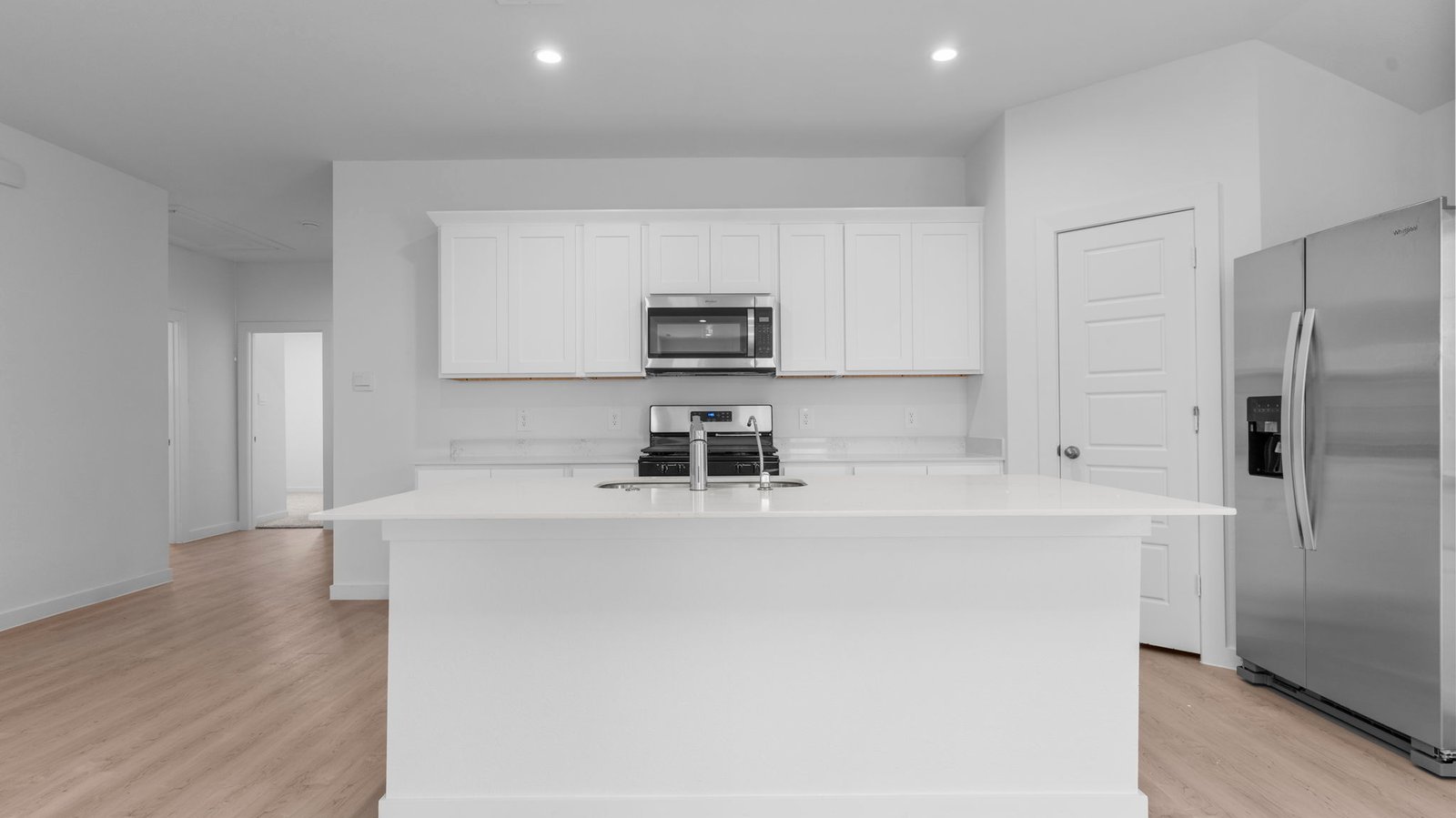 kitchen with large island and walk in pantry