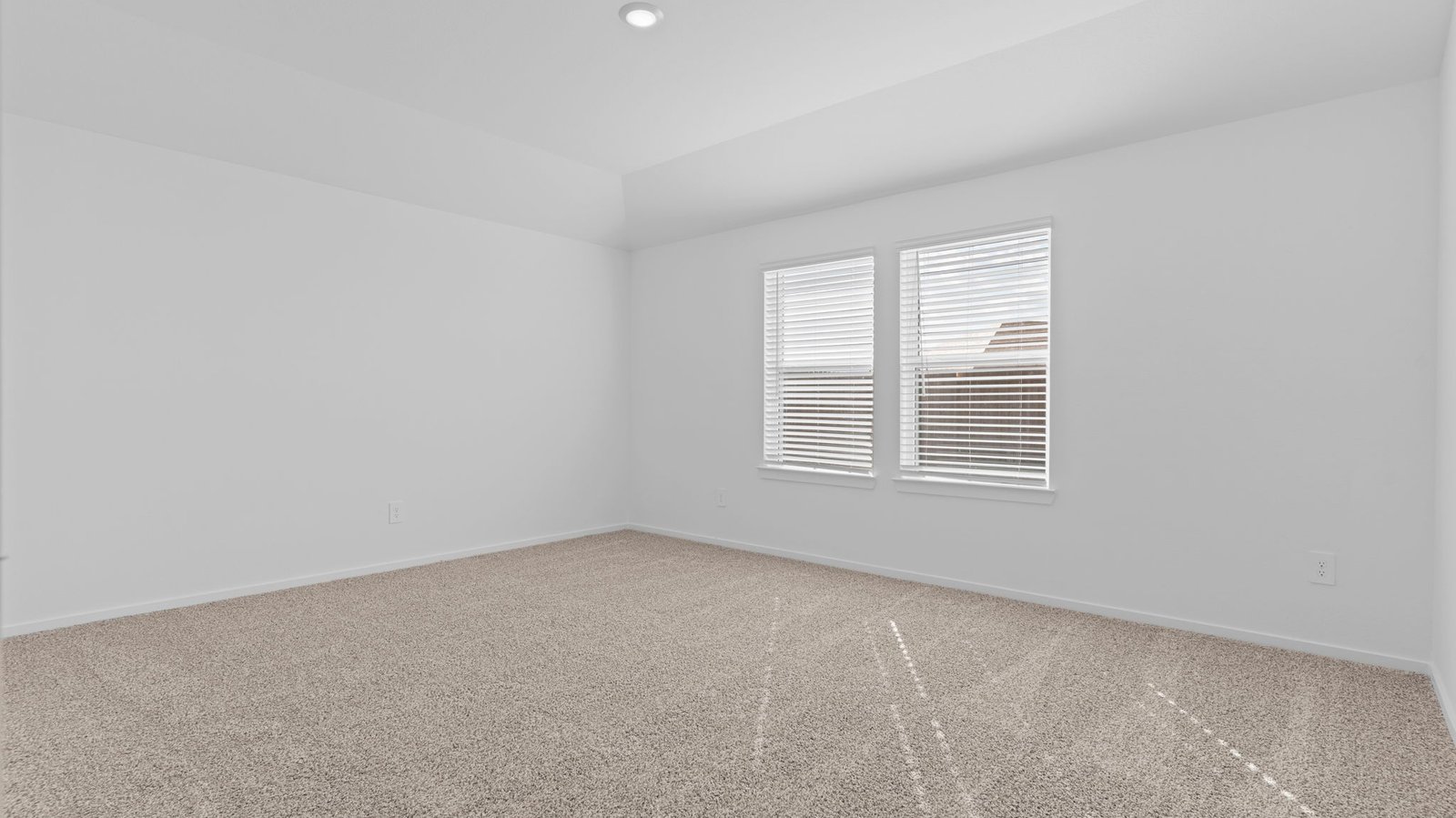 primary bedroom with large window