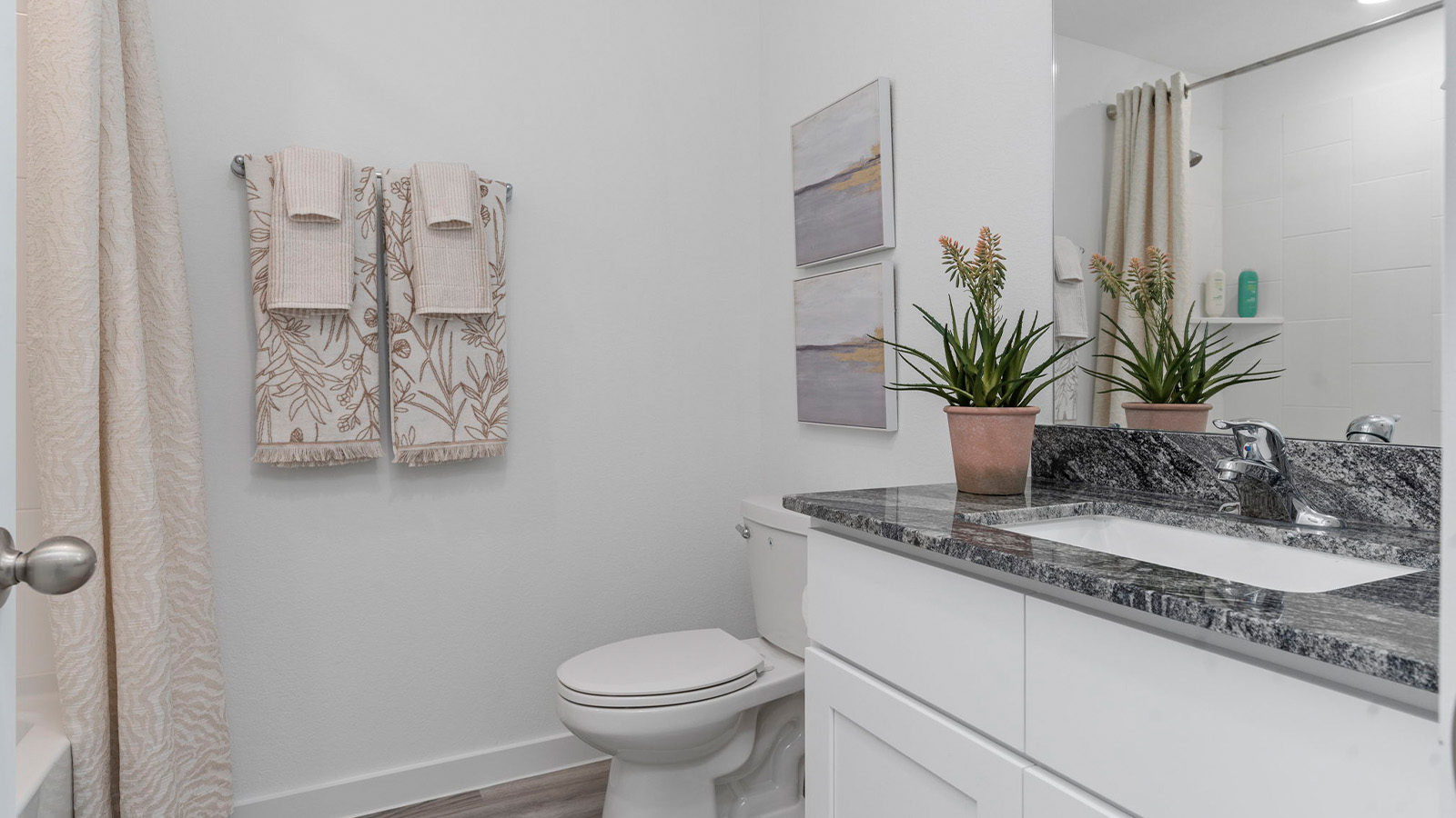 secondary bathroom with one sink