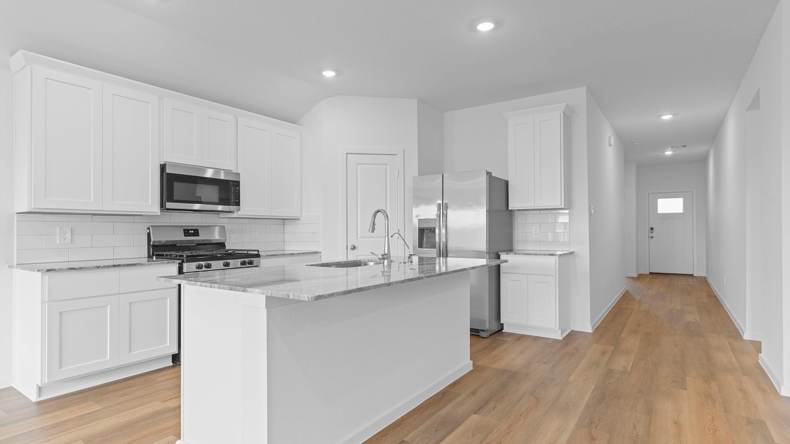 kitchen with large island and walk in pantry