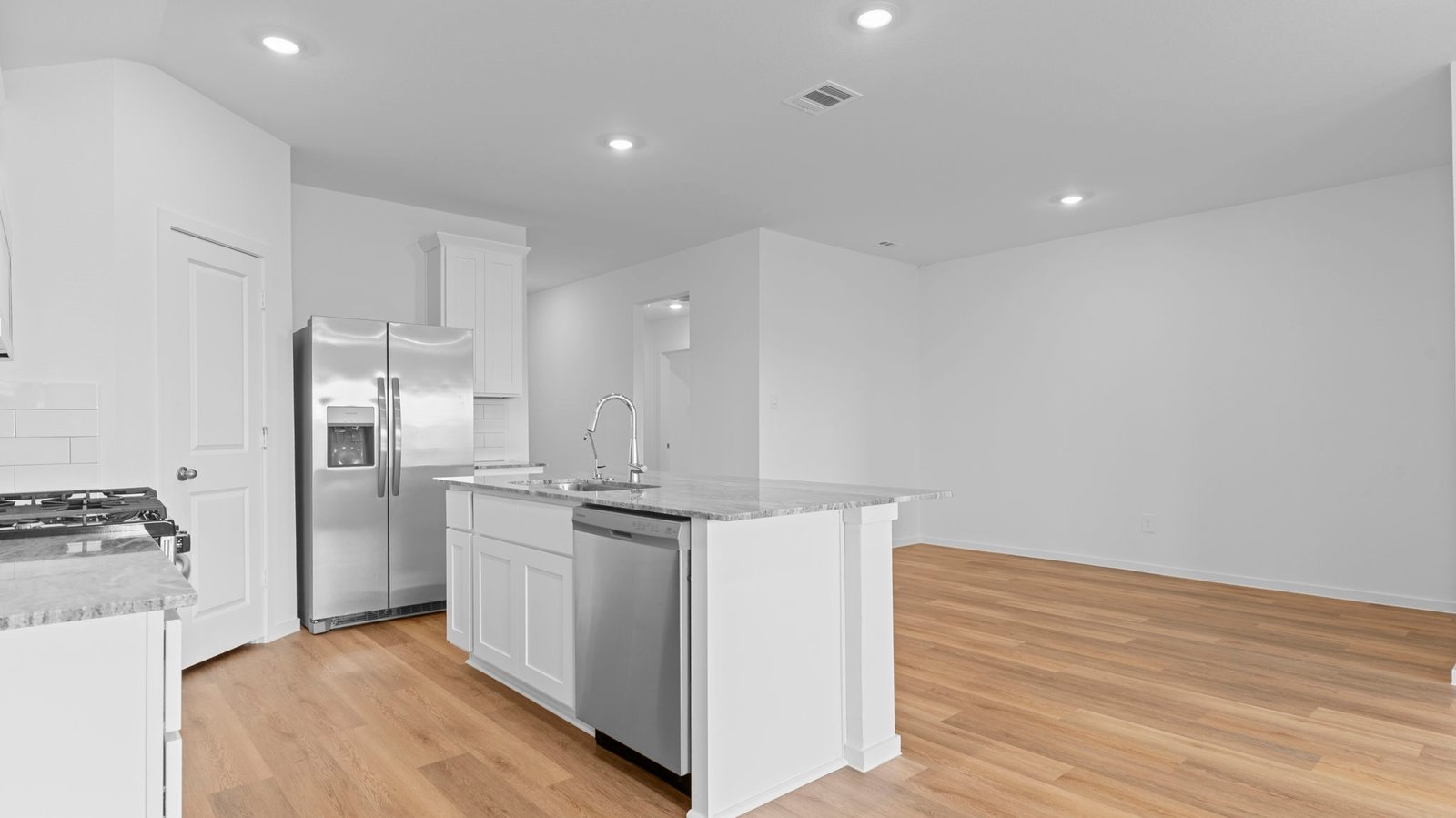 open concept kitchen and dining room