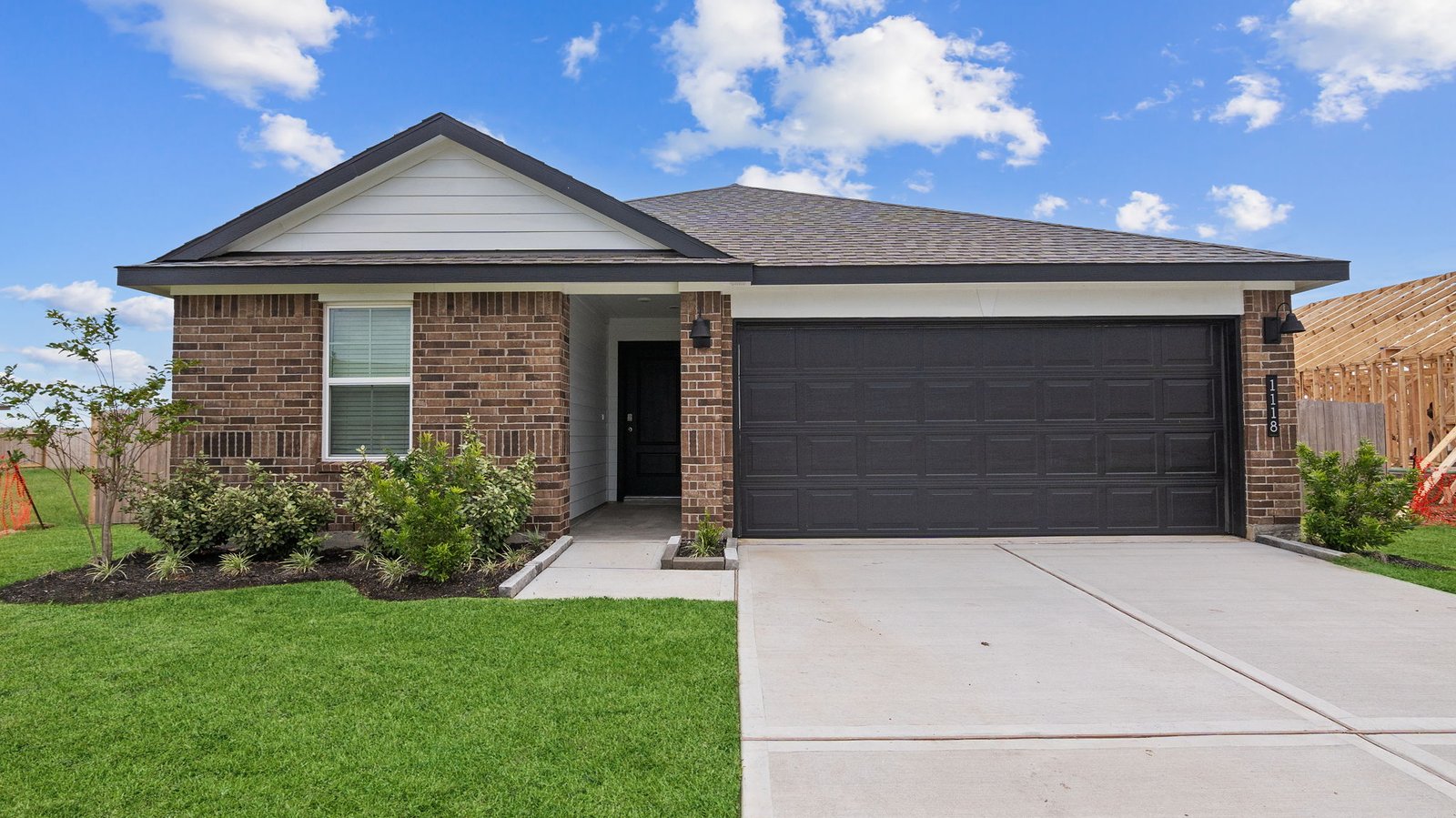 single story home with a two car garage