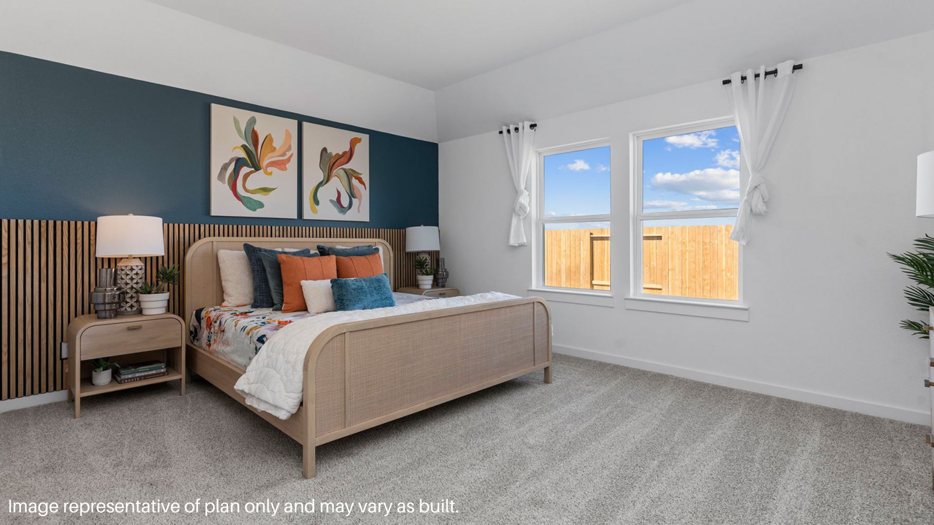 Primary bedroom with large window