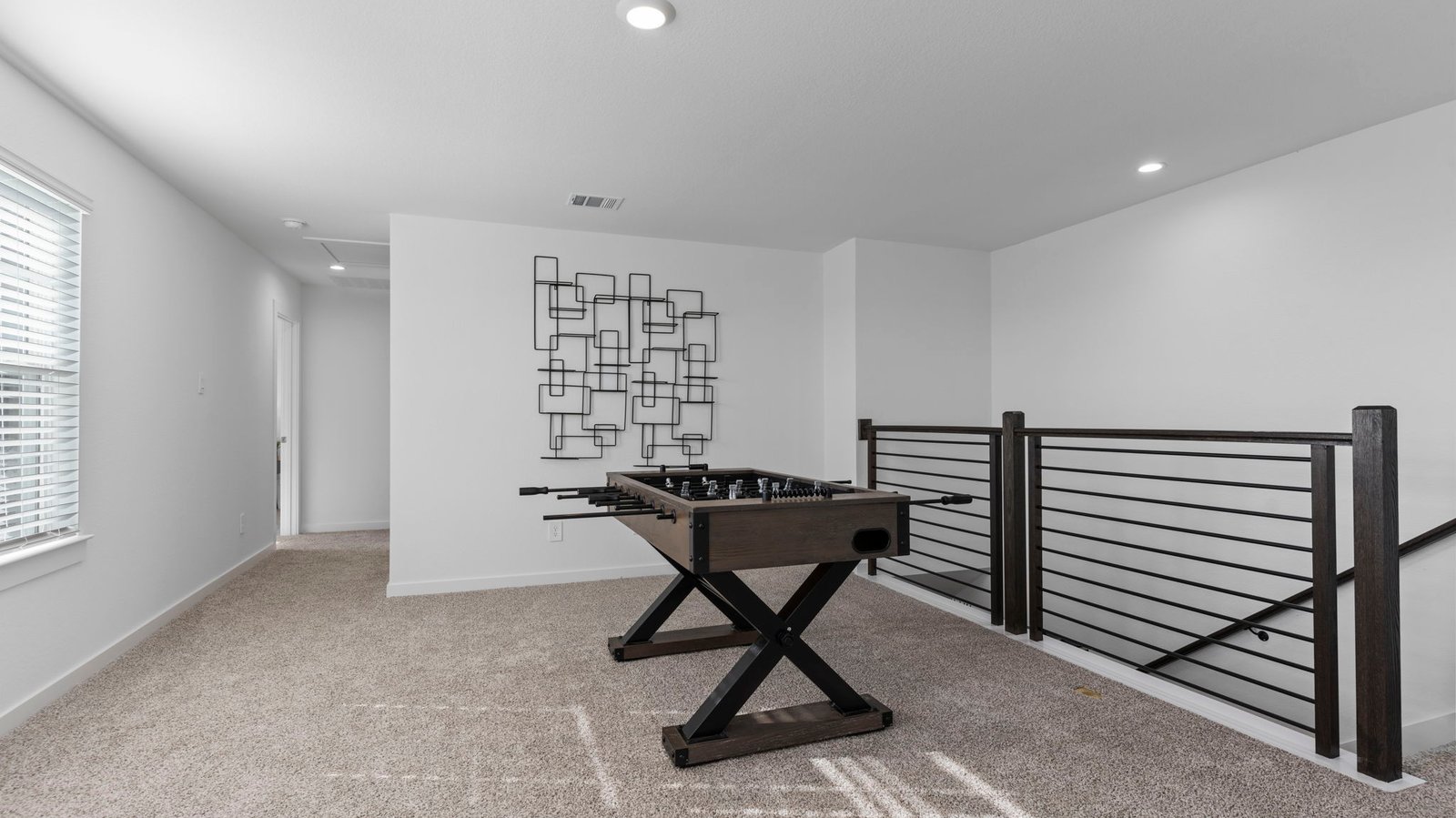 game room with large windows