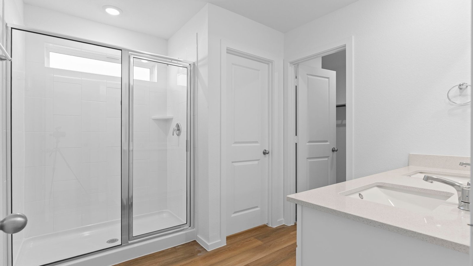 primary bathroom with glass framed shower
