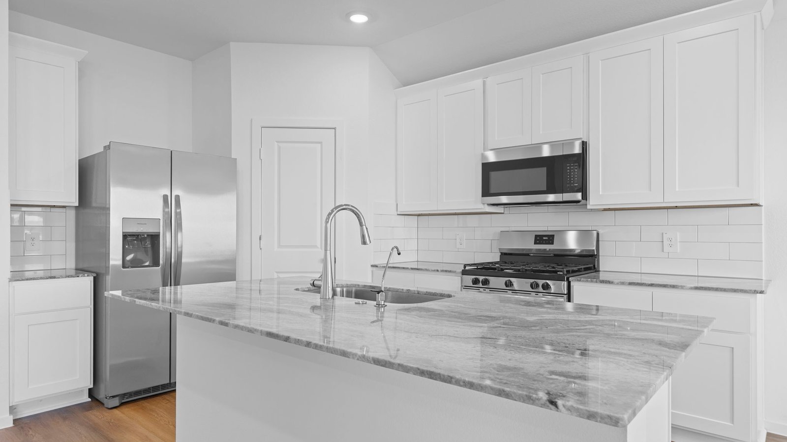kitchen with large island and walk in pantry