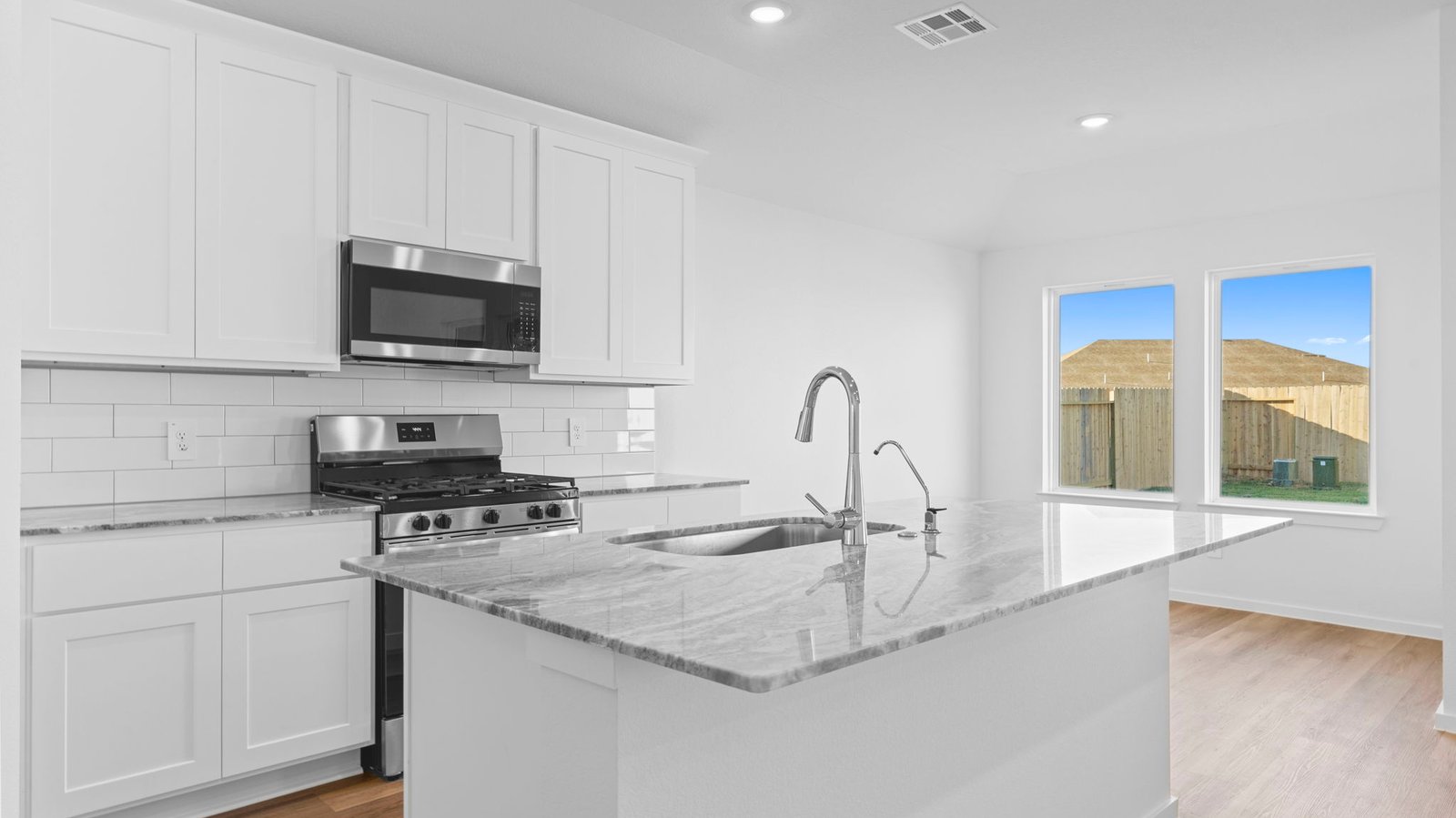 kitchen with large island and walk in pantry