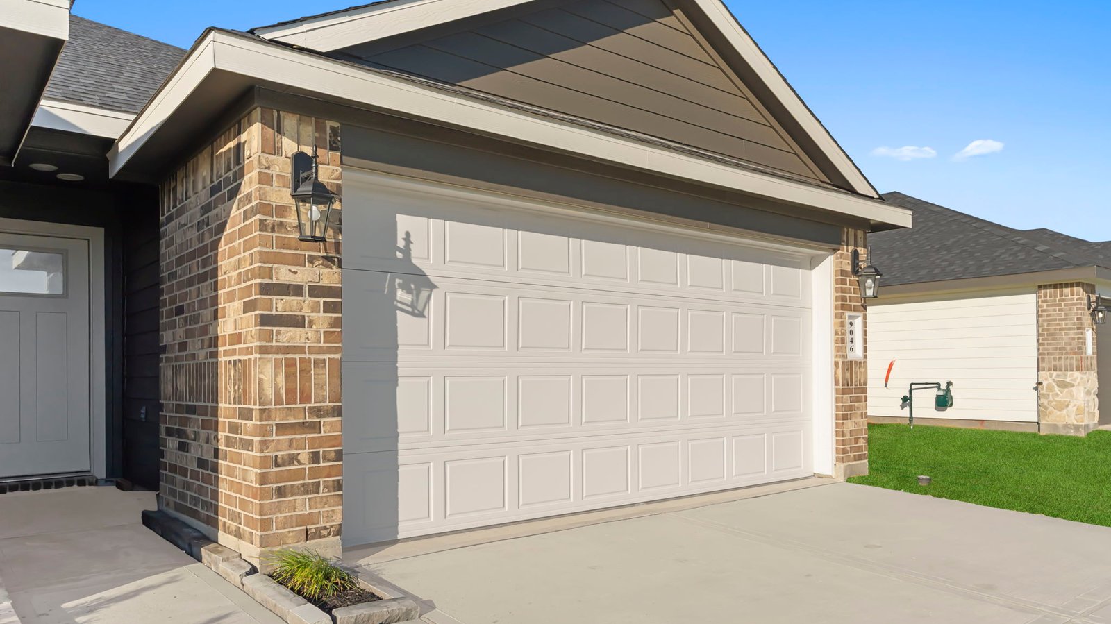 Exterior of single story modern brick style home