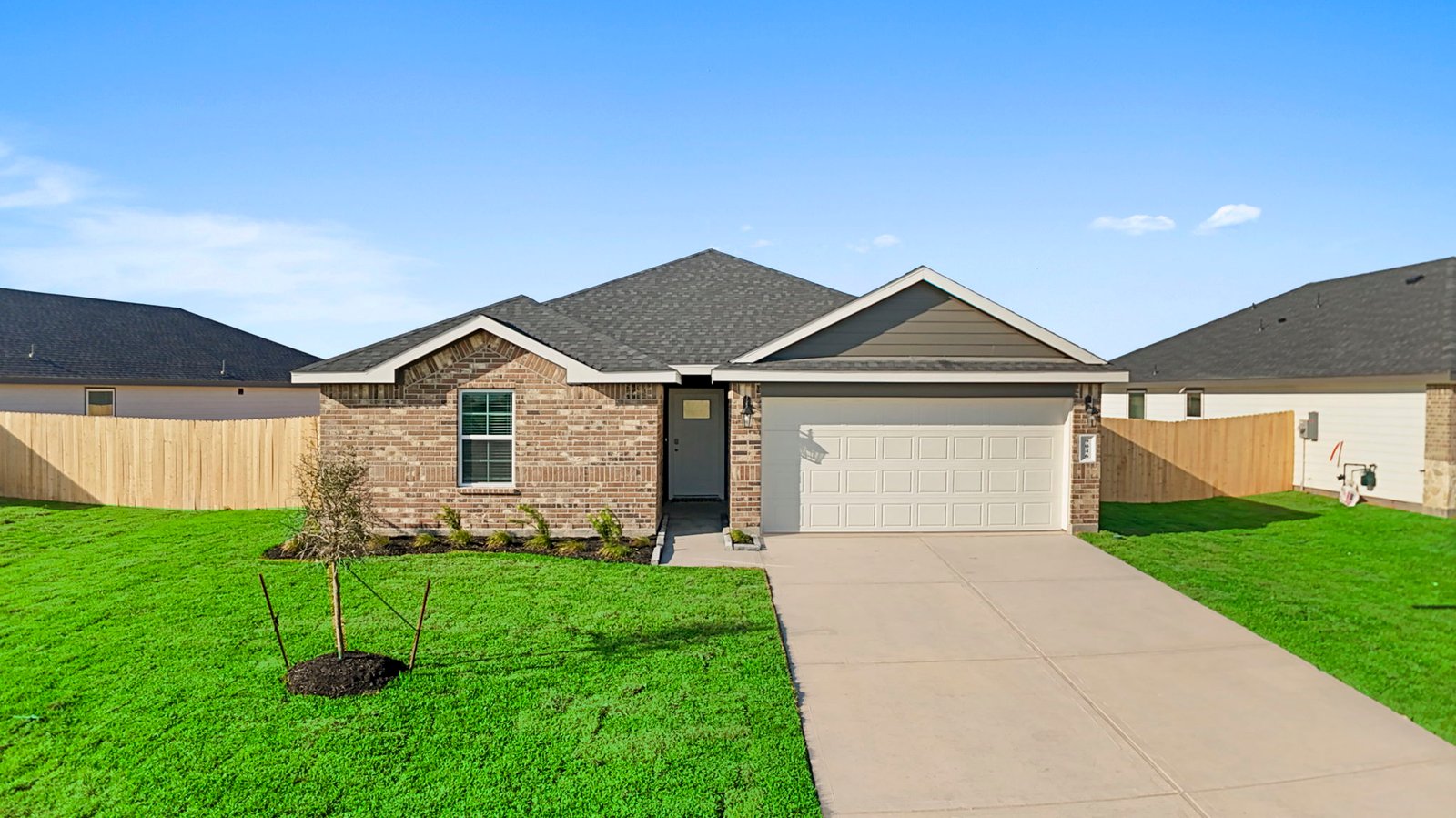 single story home with a two car garage