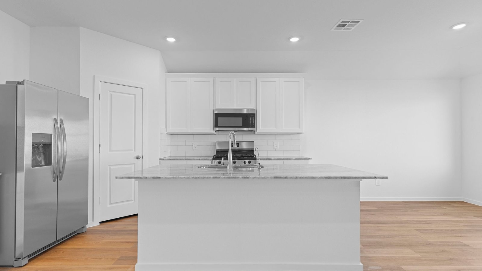kitchen with island and walk in pantry