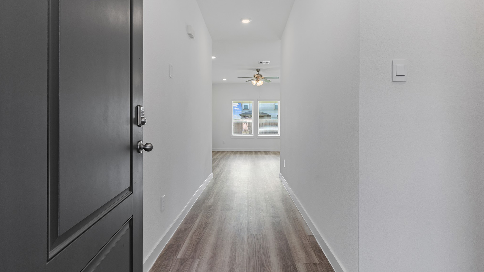 Entry way of the home leading to a hallway