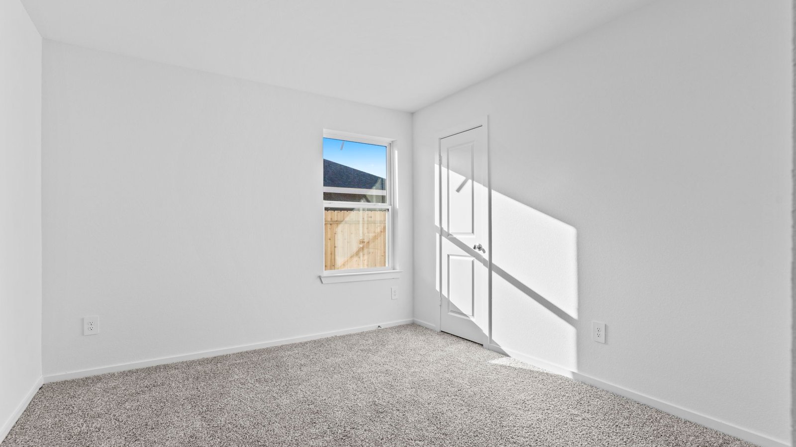 secondary bedroom with large window