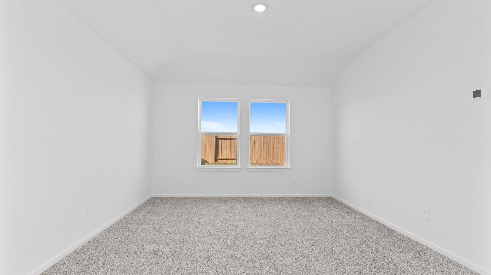 primary bedroom with large window