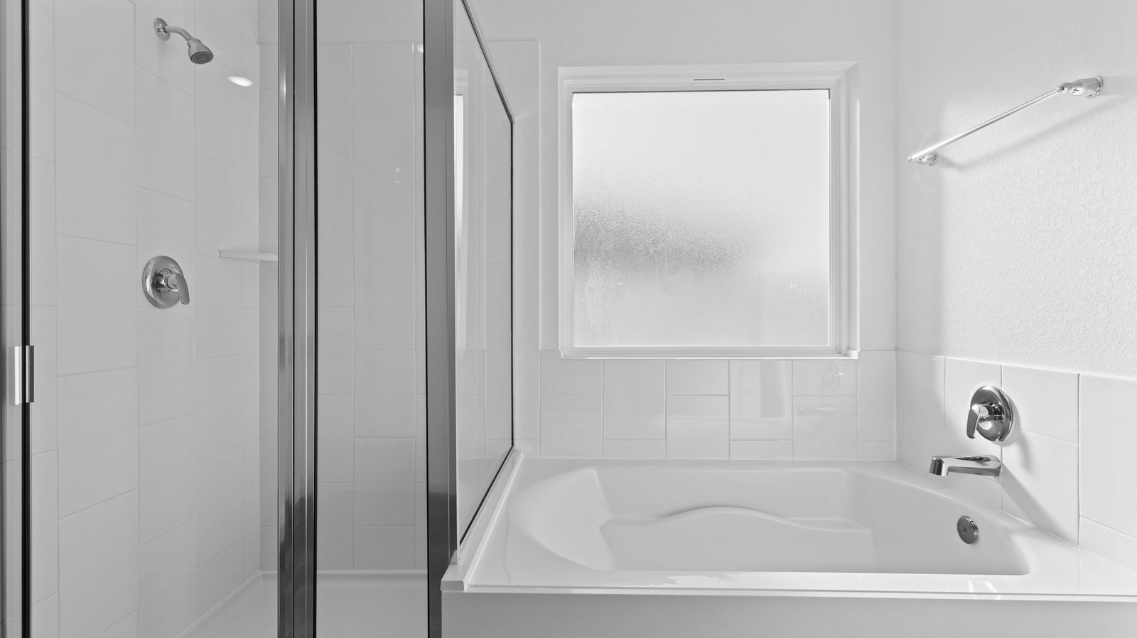 primary bathroom tub and shower