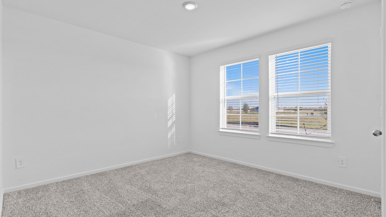 secondary bedroom with large window