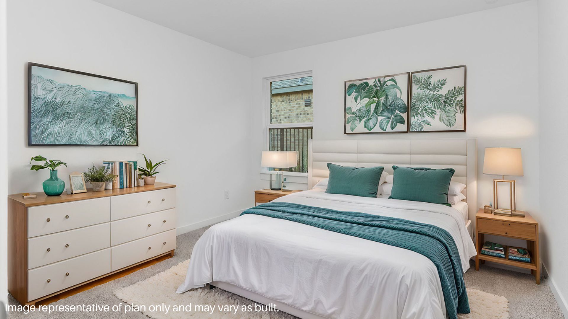 Secondary bedroom with bright window.