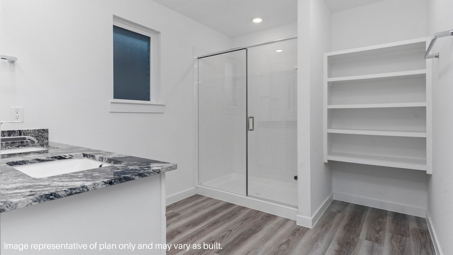 Primary Bathroom with Standing shower,double vanity sinks and built in shelving