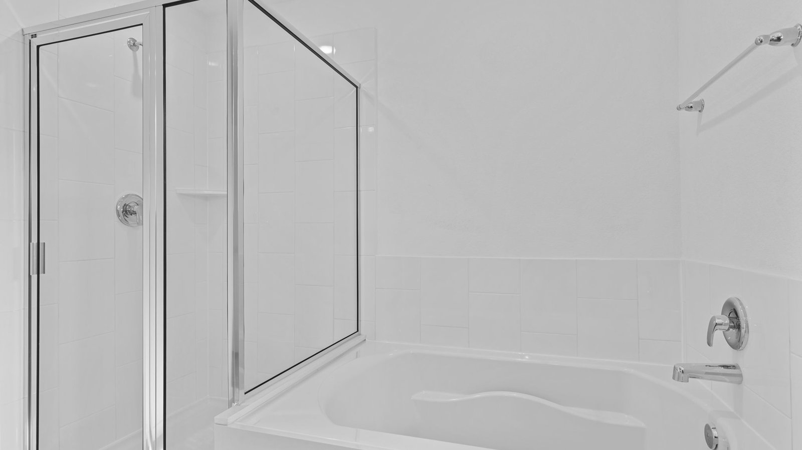 primary bathroom tub and shower
