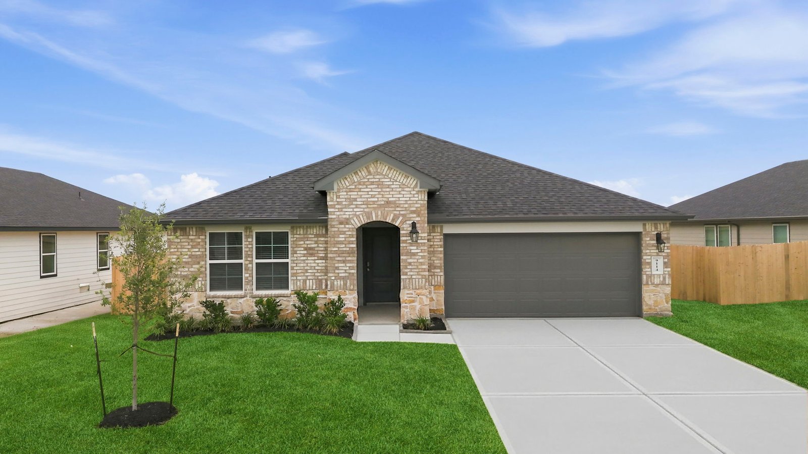 single story home with a two car garage