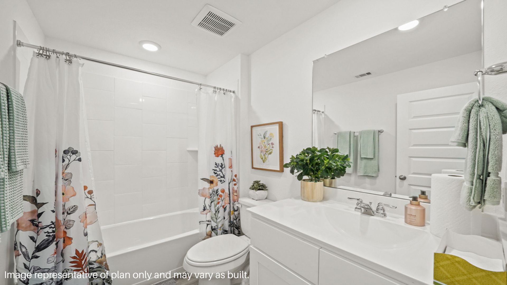 Secondary bathroom with vanity and tub/shower combo