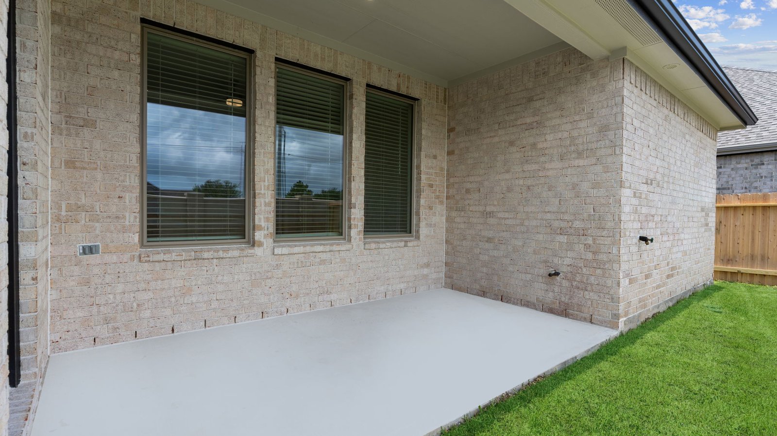Rear exterior view of the covered back patio.