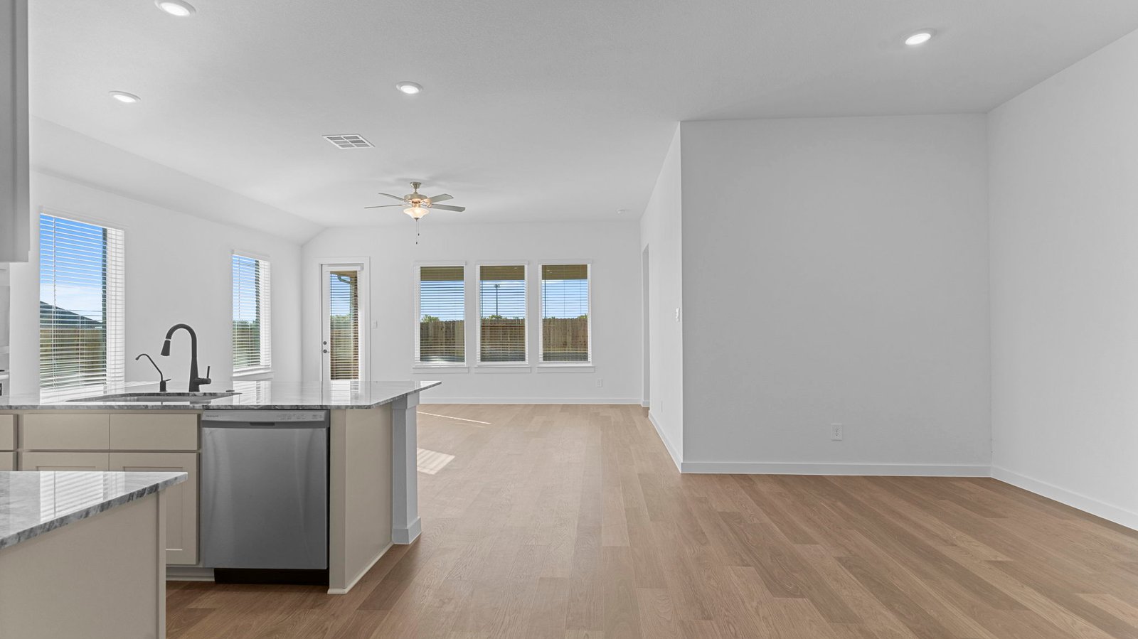 open concept kitchen dining and living room