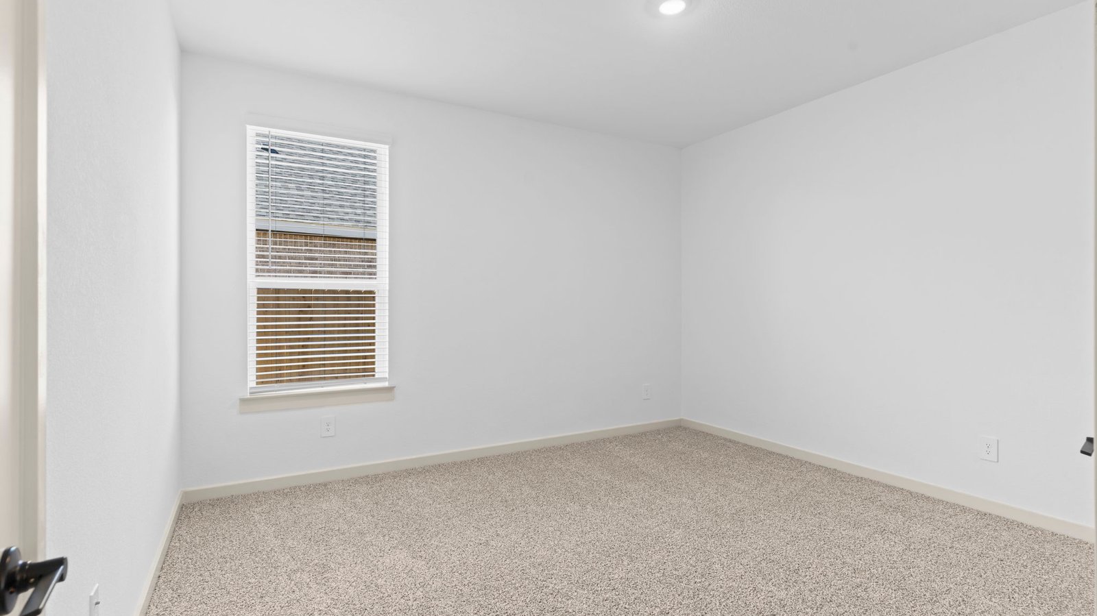 secondary bedroom with one large window