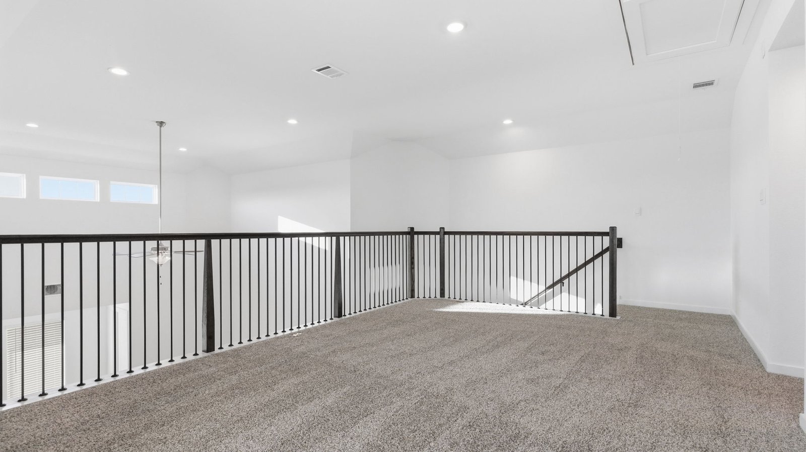 upstairs game room with large window