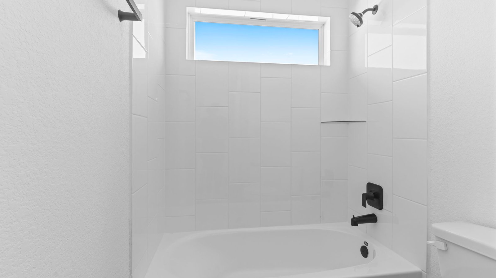 secondary bathroom bathtub and shower combo