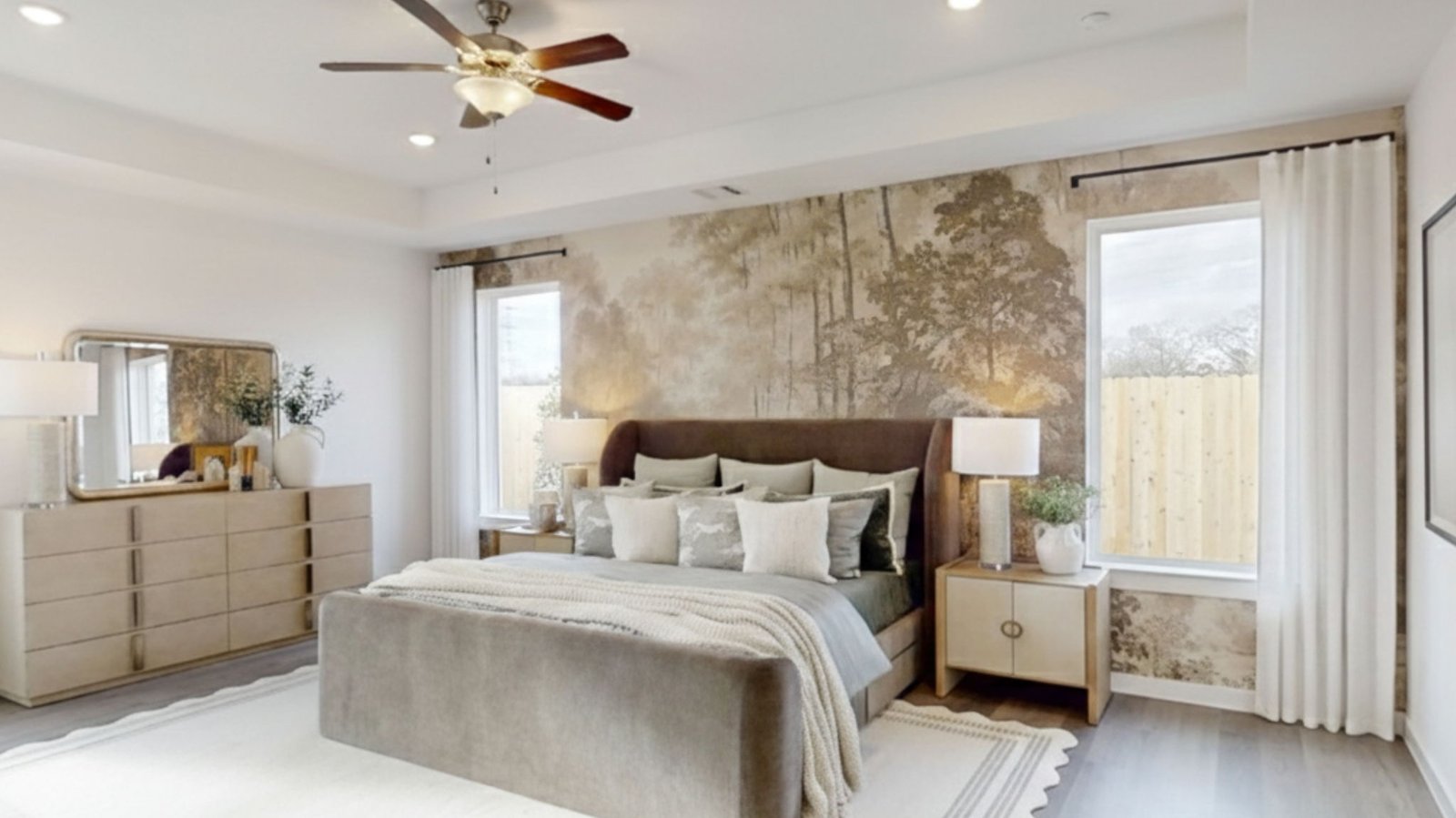 primary bedroom with two windows