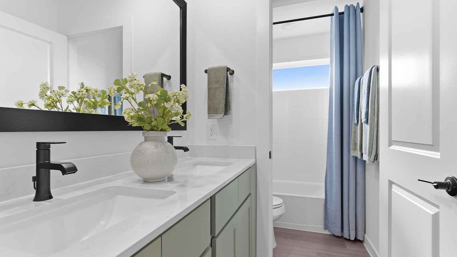 secondary bathroom with one sink