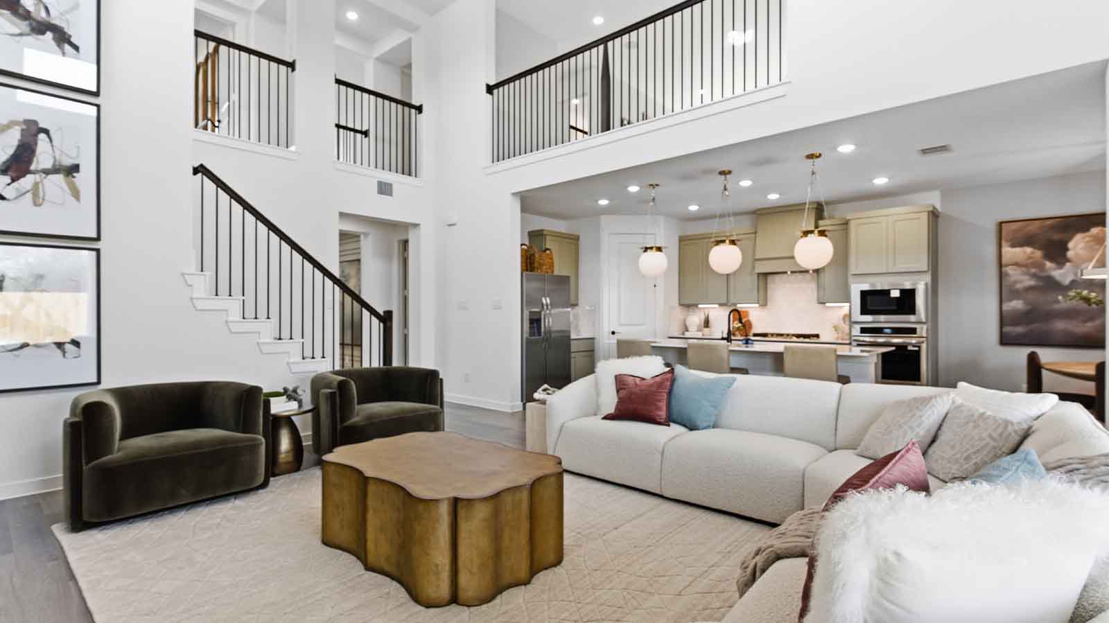 open concept living room with tall ceilings