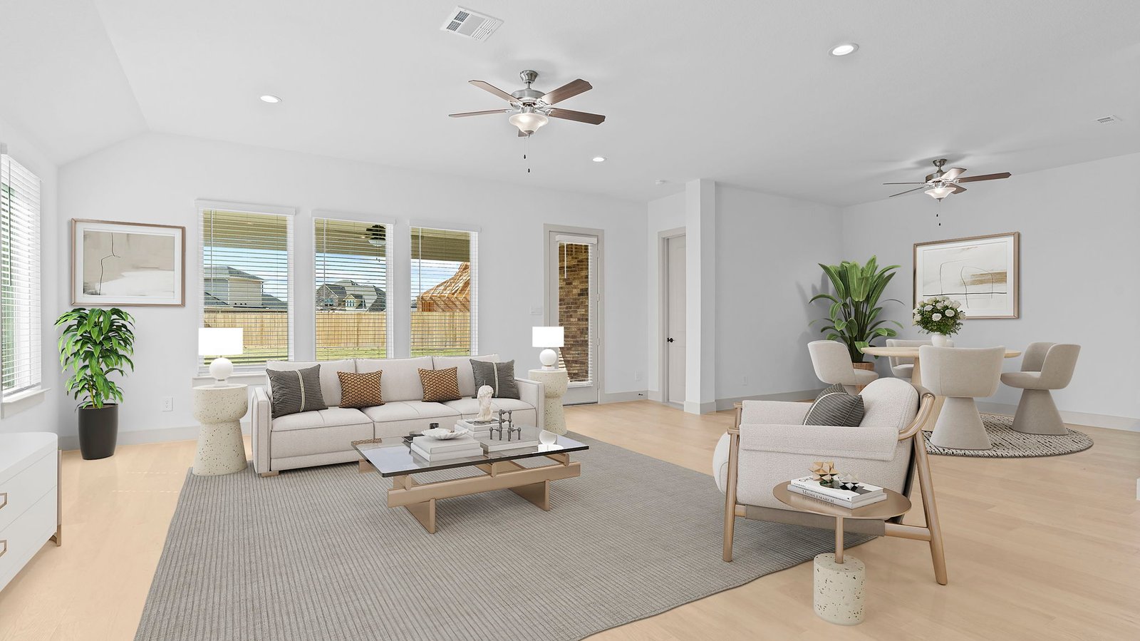 open concept living room with multiple windows