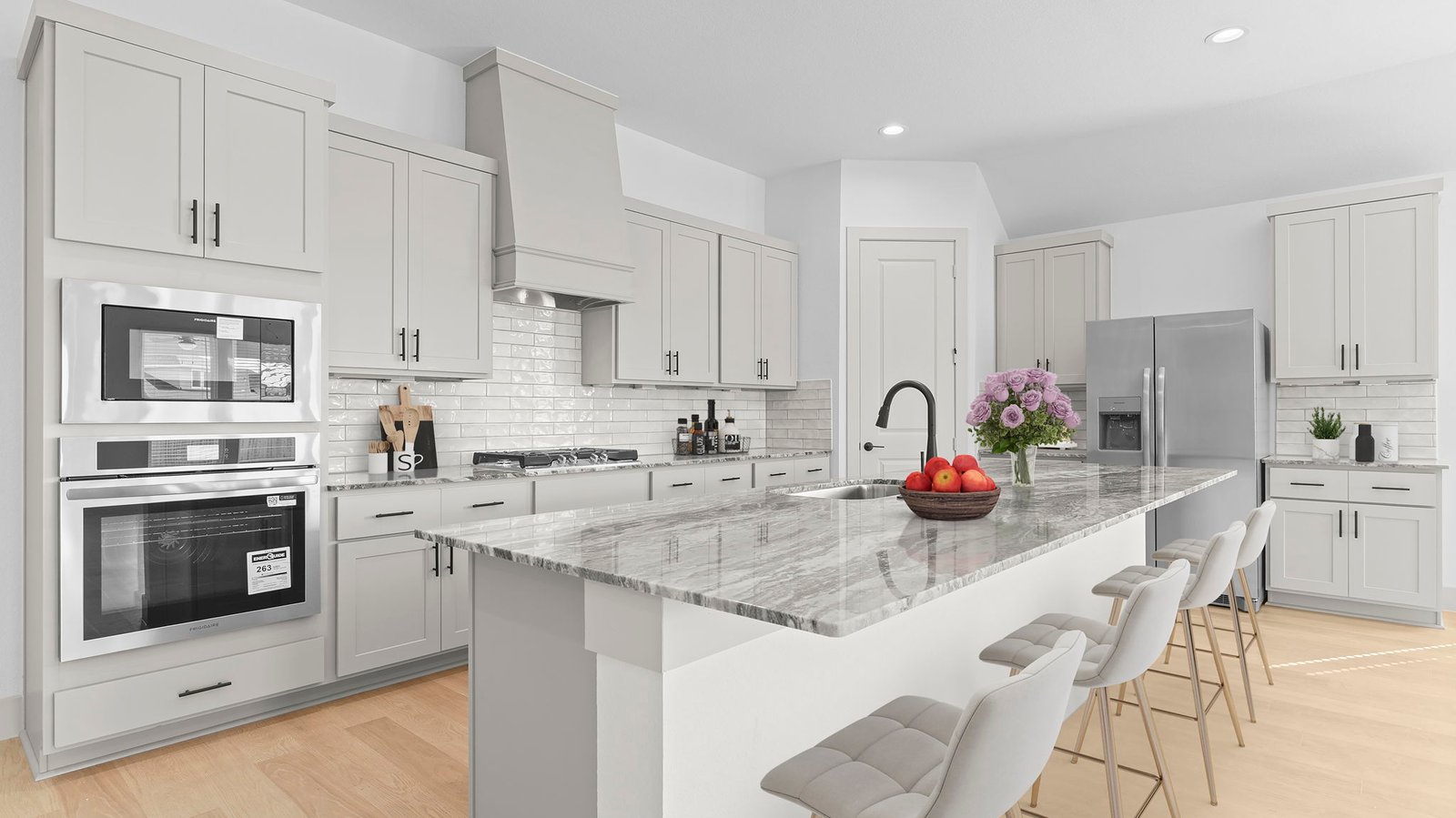 kitchen with large island and walk in pantry