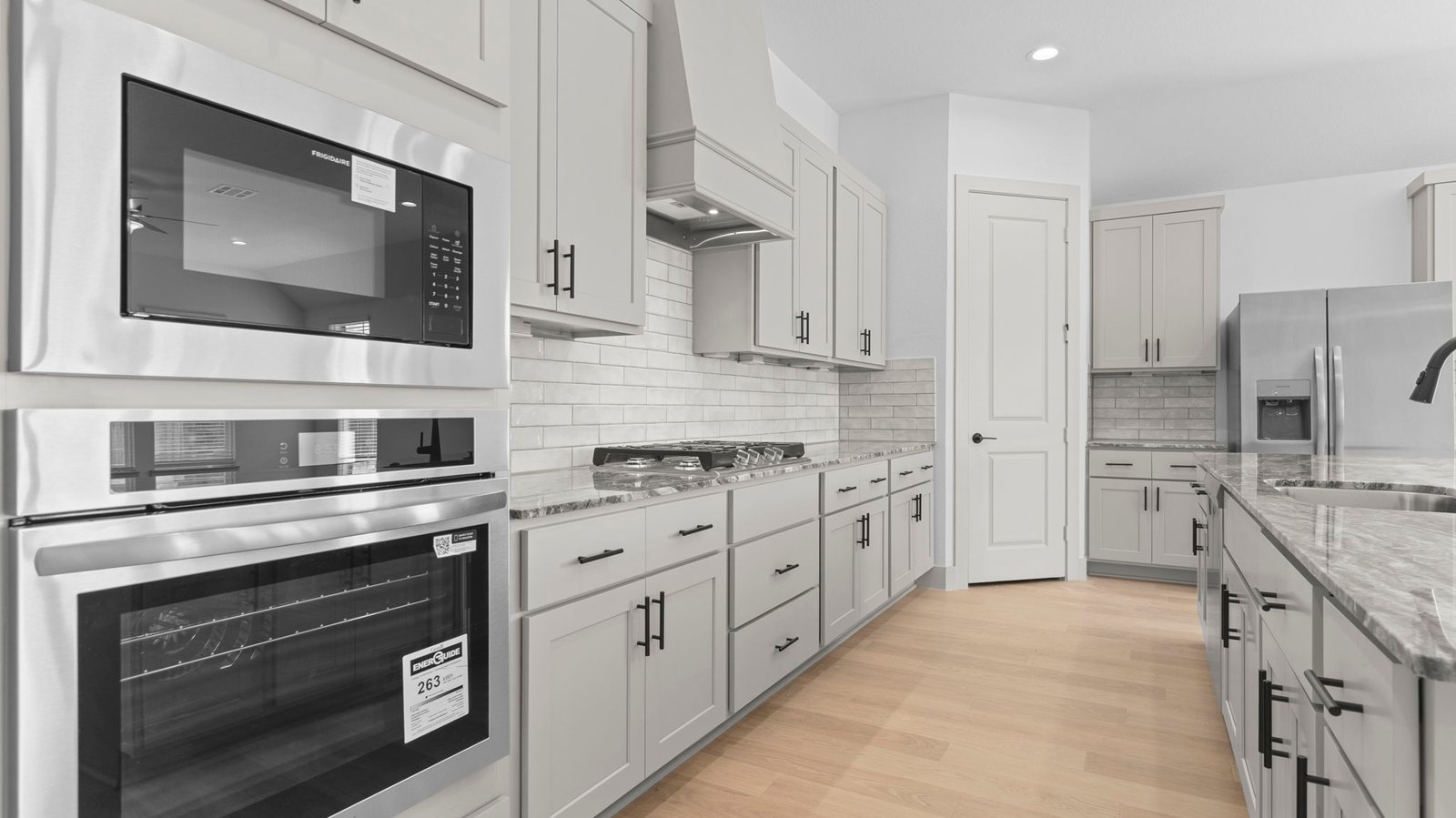 kitchen with large island and walk in pantry