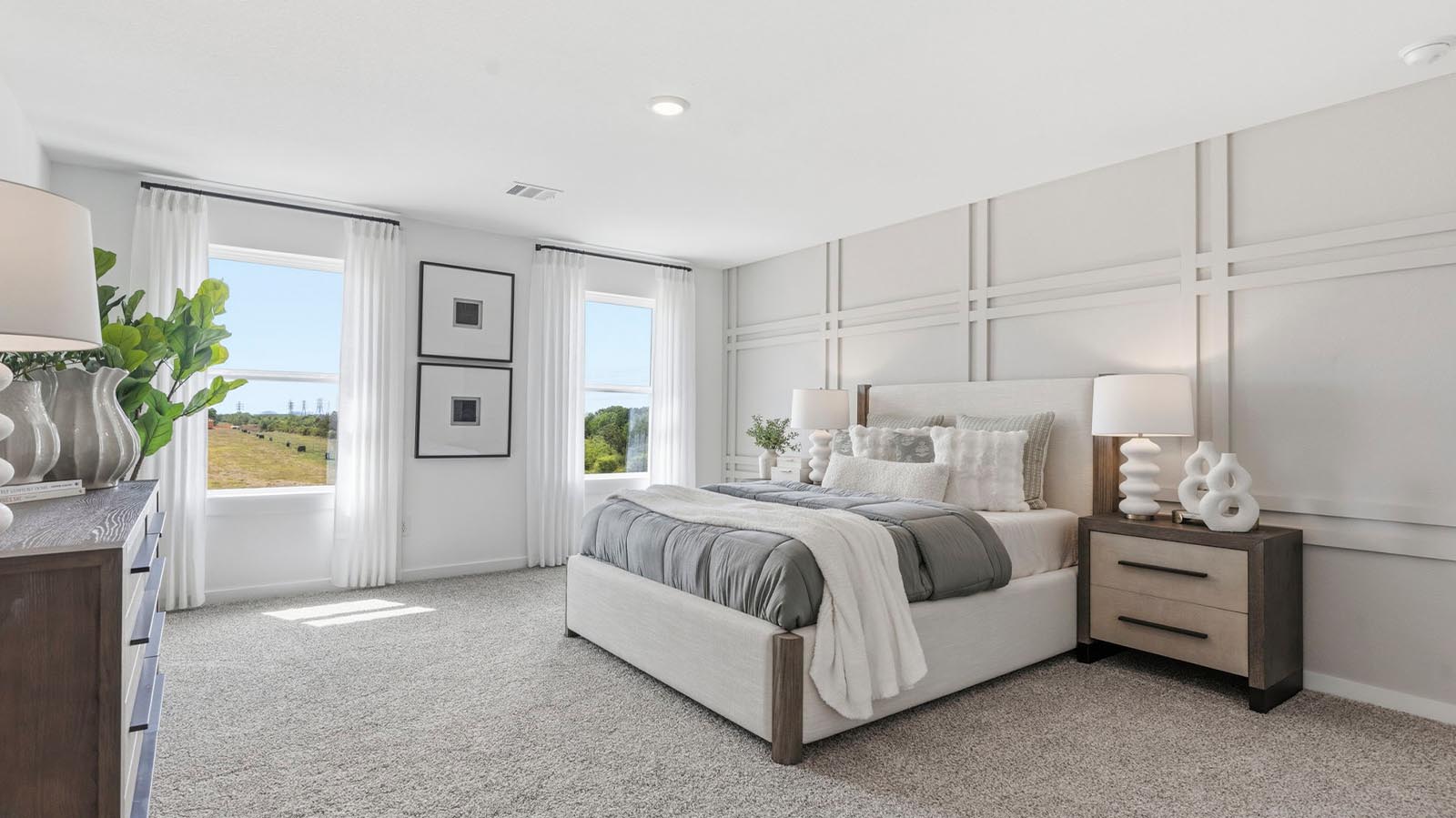 secondary bedroom with two windows