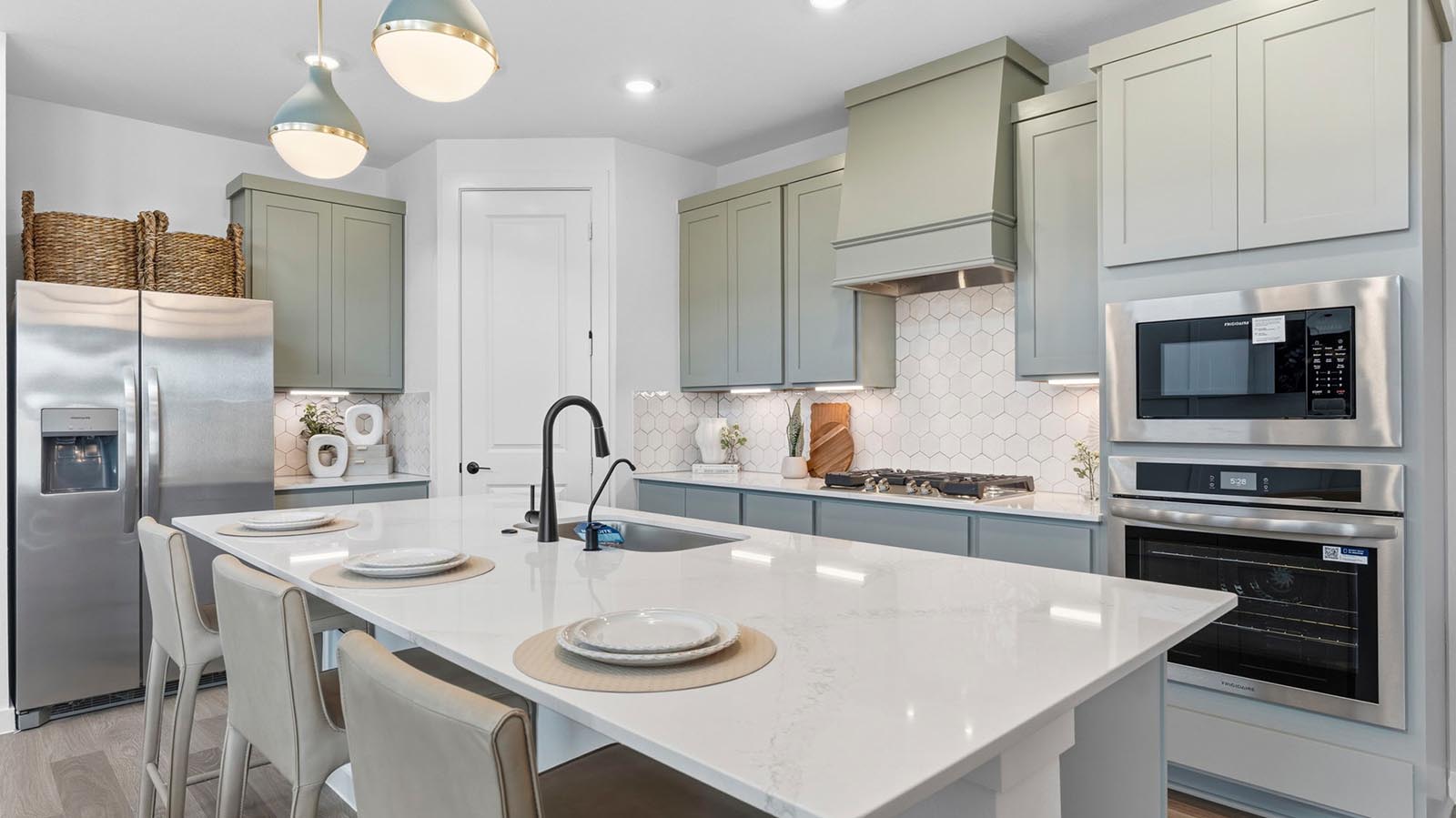 kitchen with large island and walk in pantry