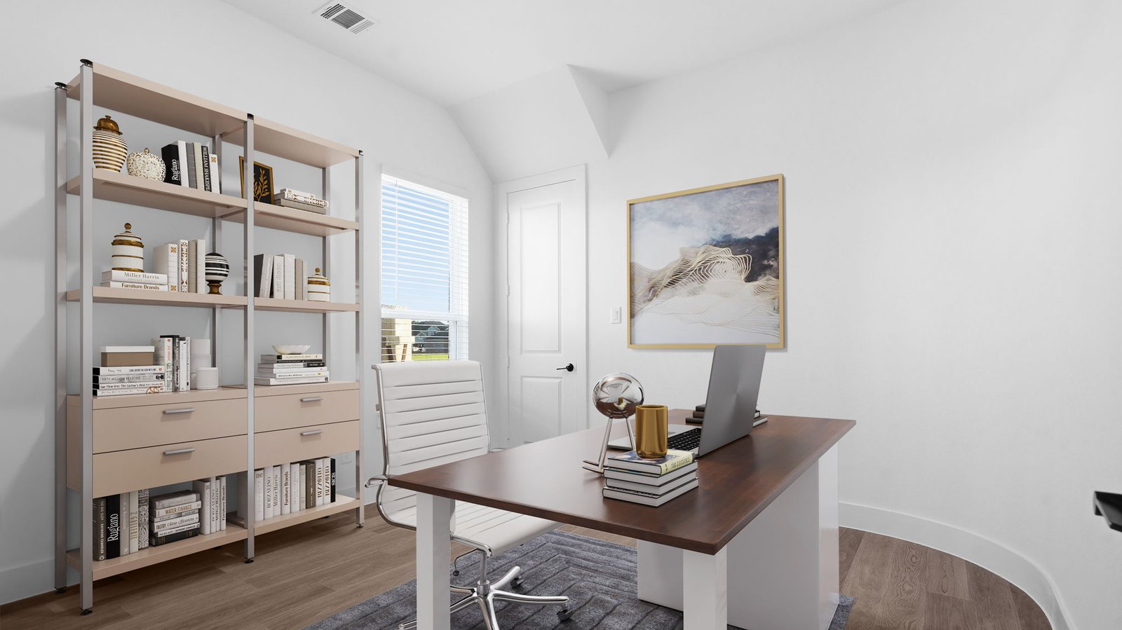 A tidy office featuring a desk, chair, and a window, creating a bright and organized workspace.