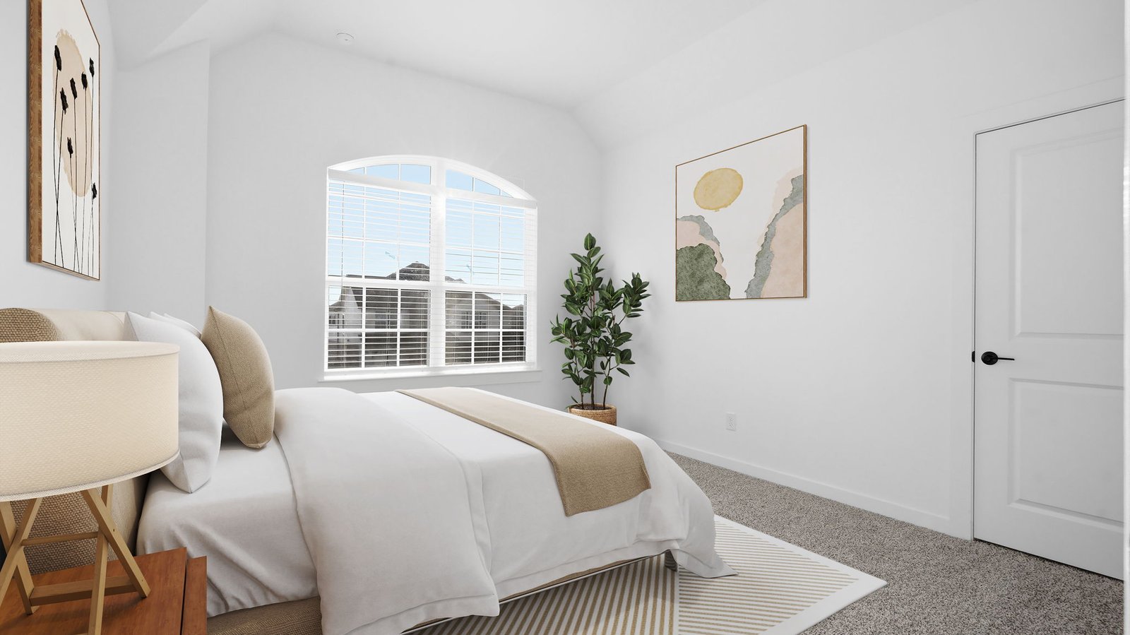 Comfortable guest bedroom featuring neutral-toned walls, carpeted flooring, and a separate closet.