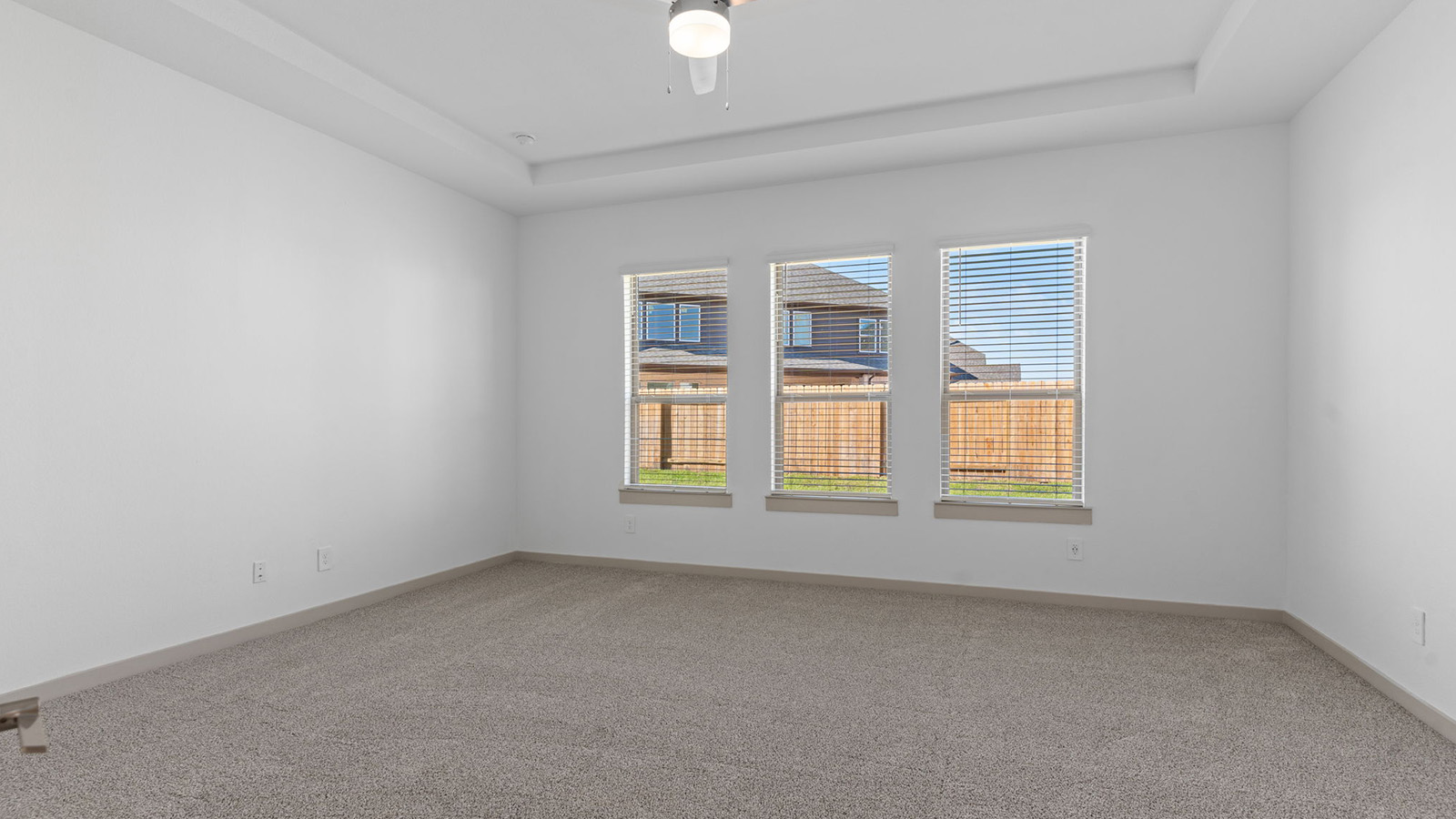 primary bedroom with large window