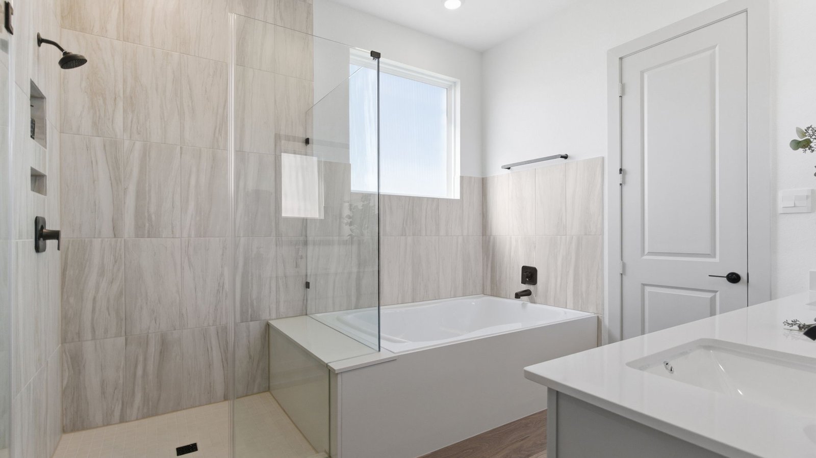 primary bathroom separate shower and soaking tub