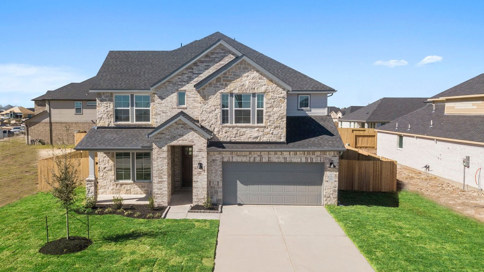 Chloe two story brick floor plan elevation located in Pearland Texas