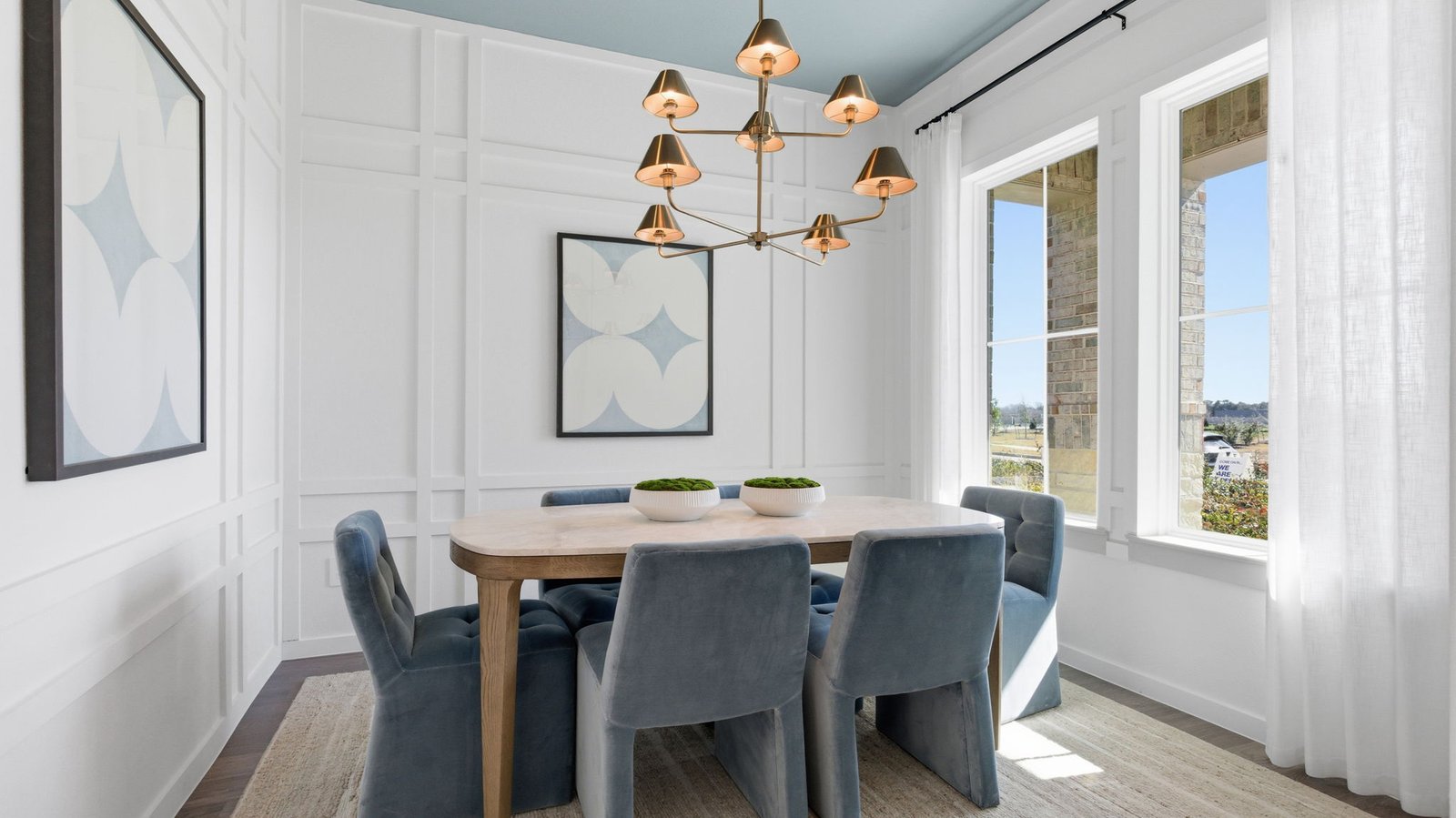dining room with two large windows
