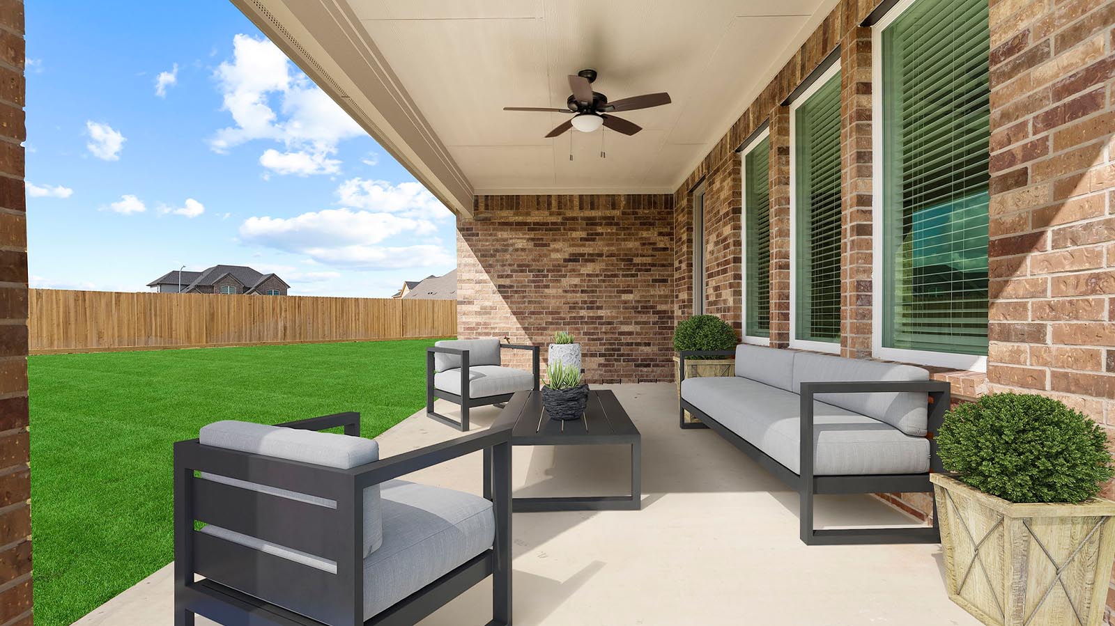 A laundry room featuring a washer and dryer, neatly arranged with ample space for laundry tasks and storage.
