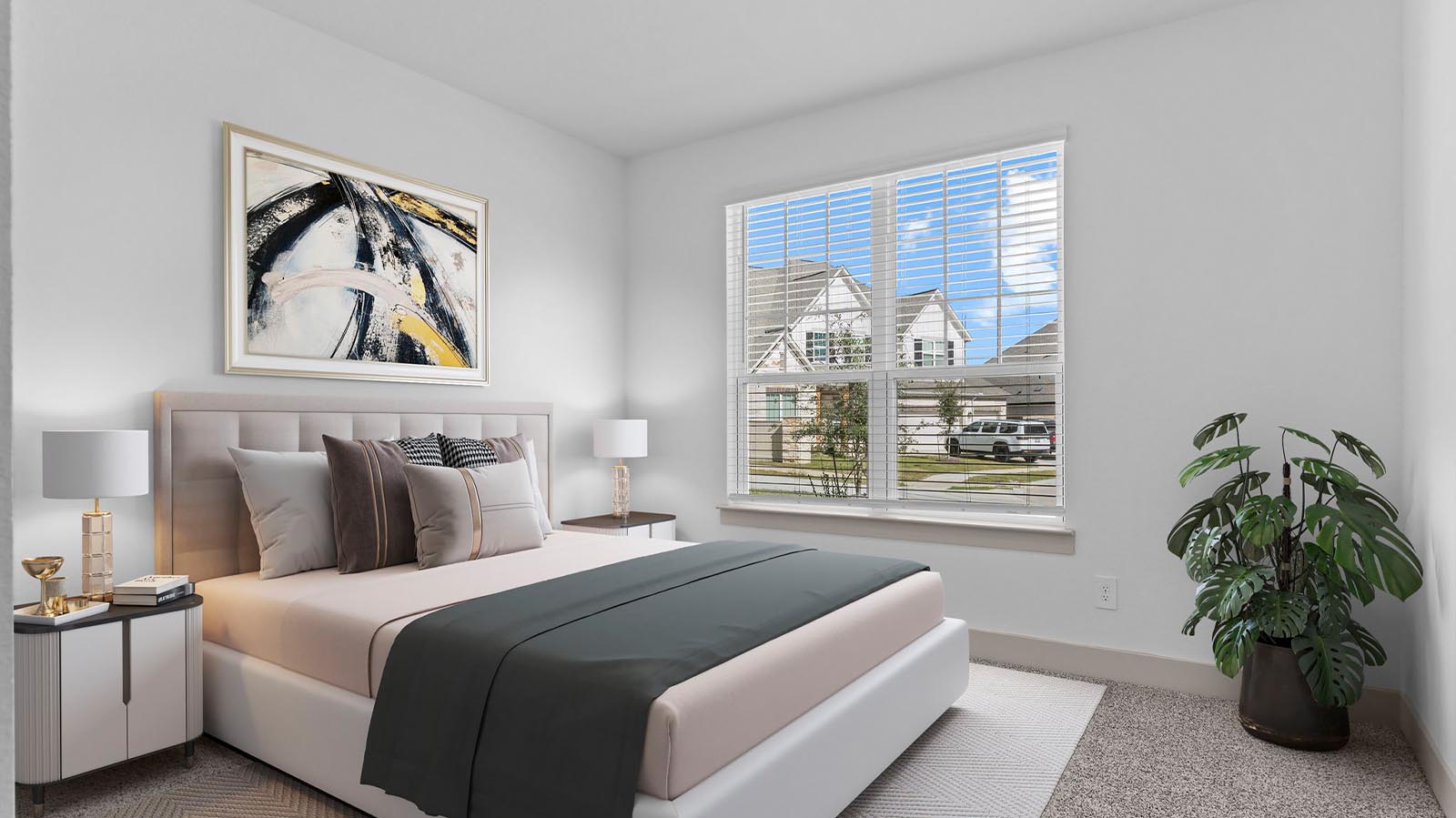 Comfortable guest bedroom featuring neutral-toned walls, carpeted flooring, and a separate closet.