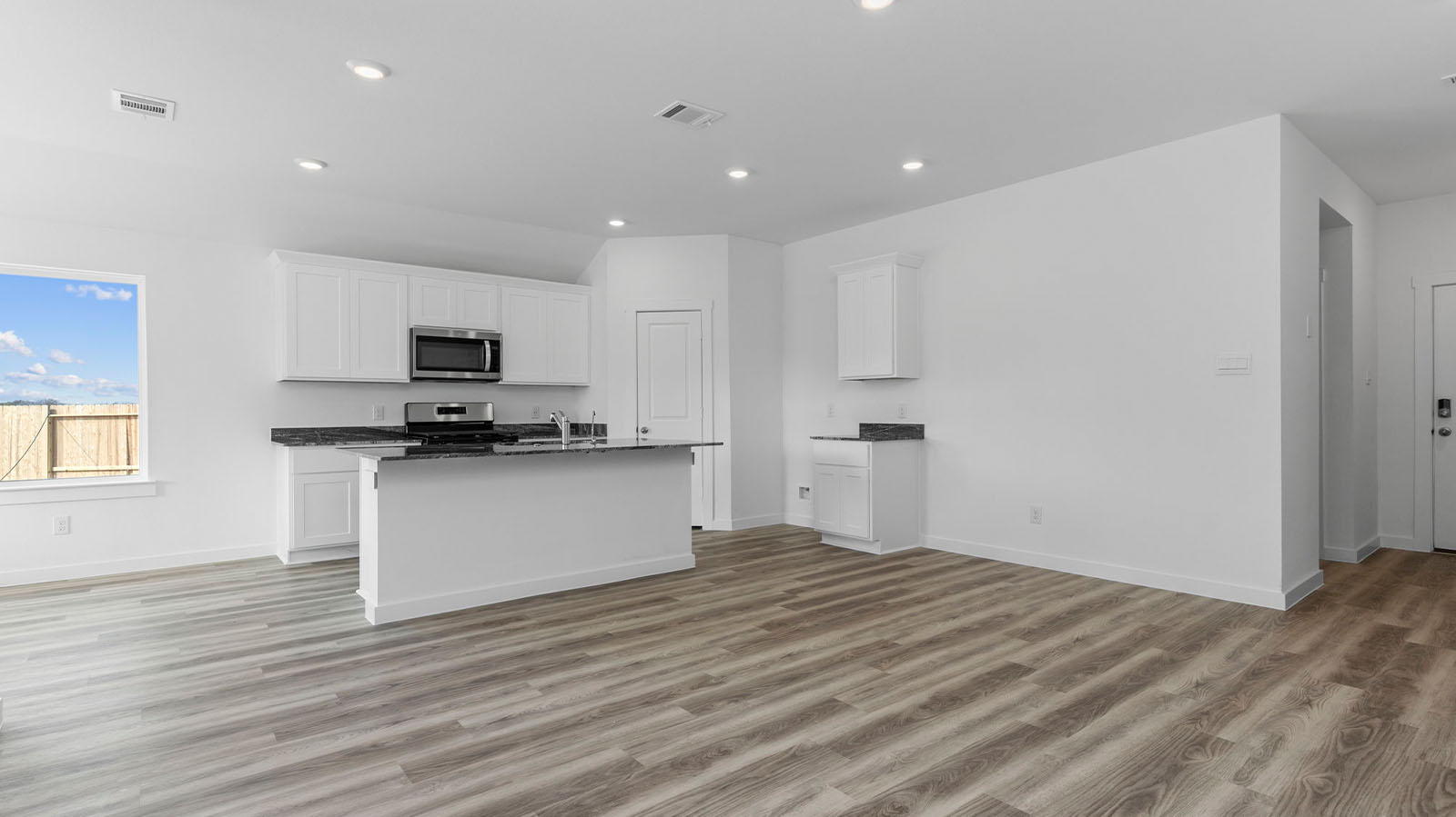 Open concept kitchen and dining room