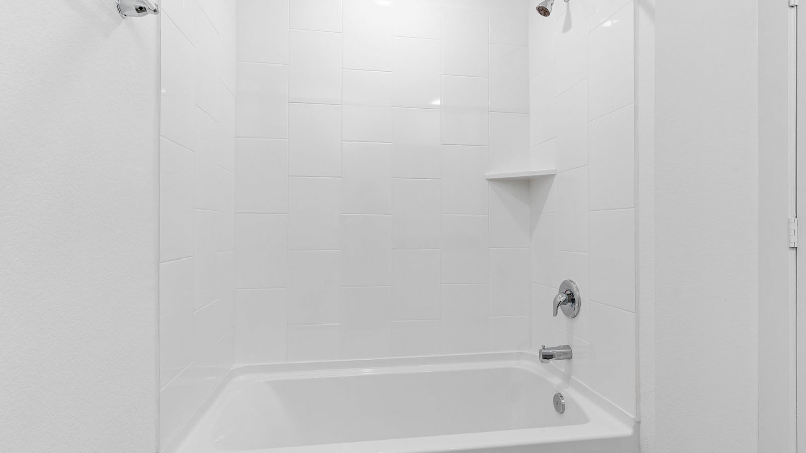Secondary bathroom with shower and bathtub combo