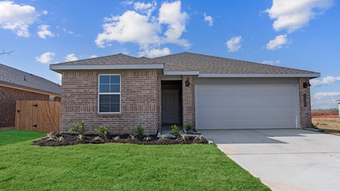 Single story brick home with a two car garage