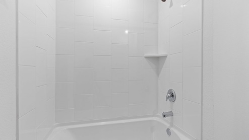 Secondary bathroom with shower and bathtub combo