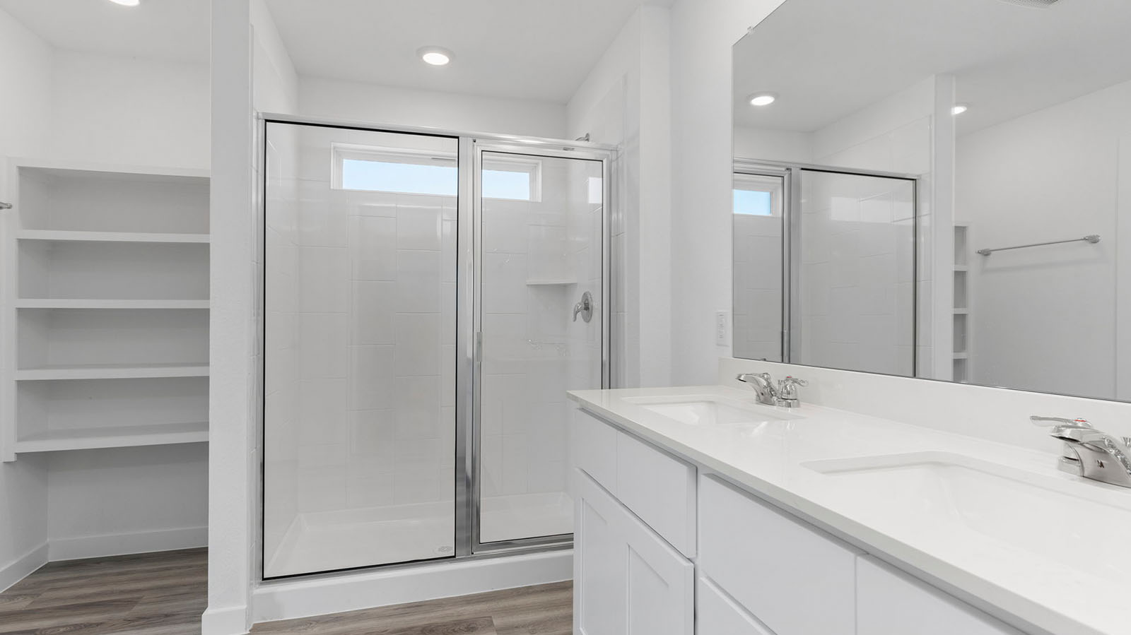 Primary bathroom with shower and open shelving
